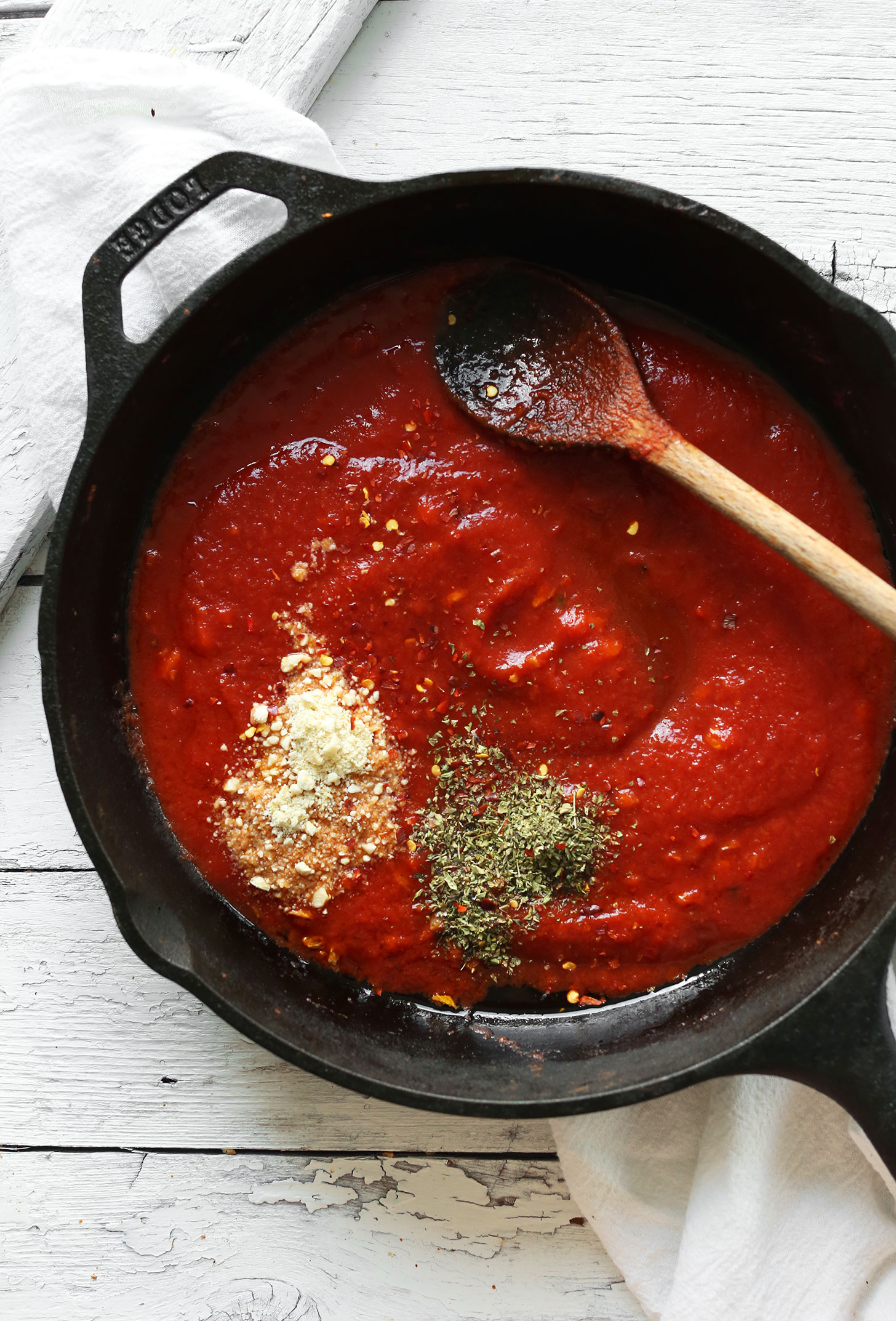 Cast-iron skillet filled with ingredients for making our amazing Chickpea Bolognese sauce