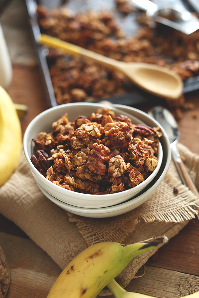 Bowl and baking sheet filled with gluten-free vegan Banana Bread Granola