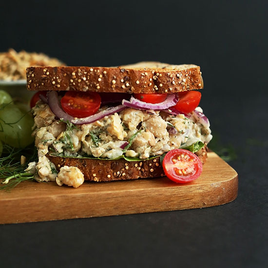 Chickpea Sunflower Sandwich on a cutting board
