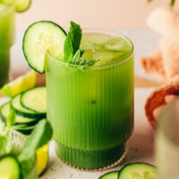 Close up shot of a glass of cucumber lime agua fresca