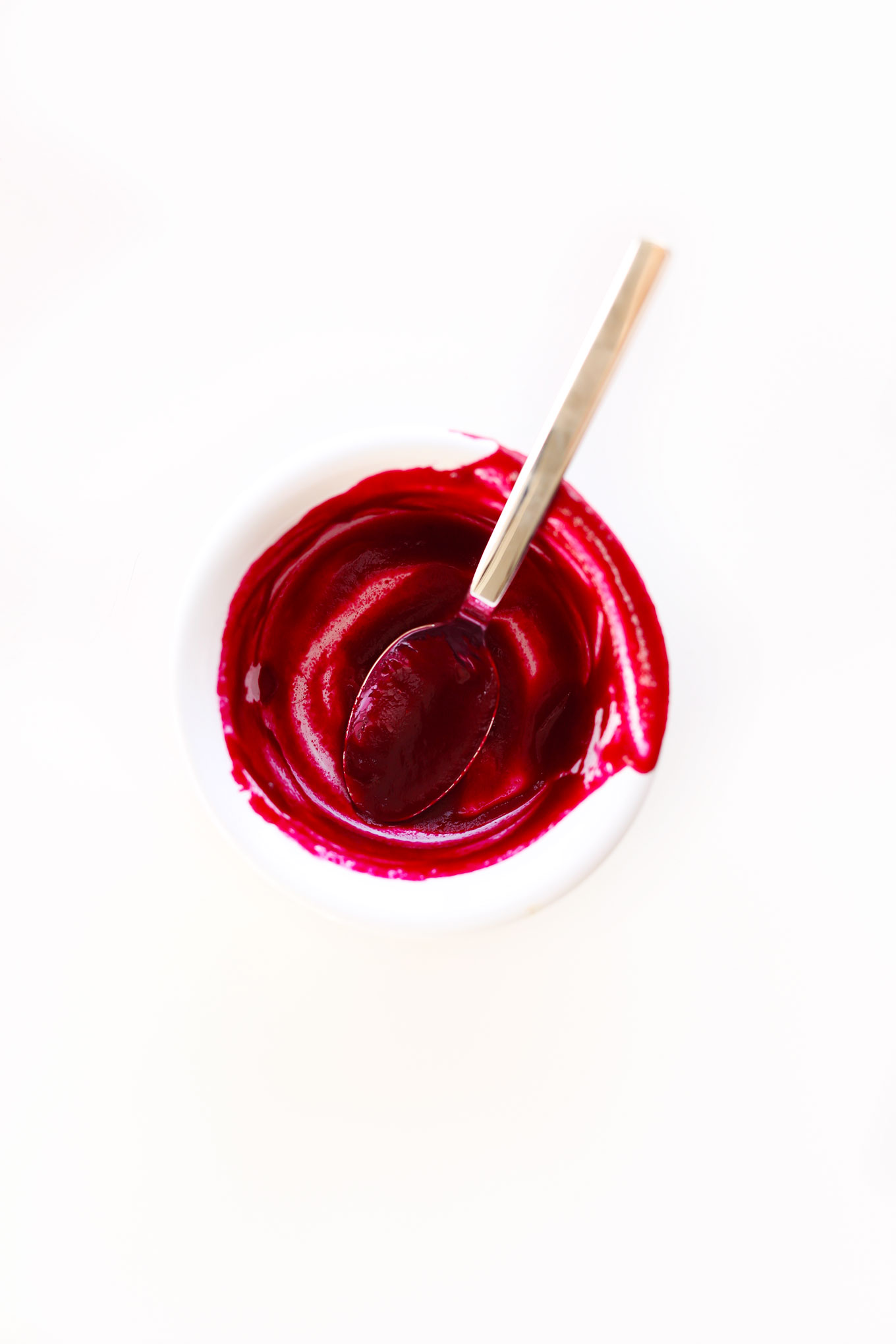 Bowl and spoon coated in DIY Beet Puree