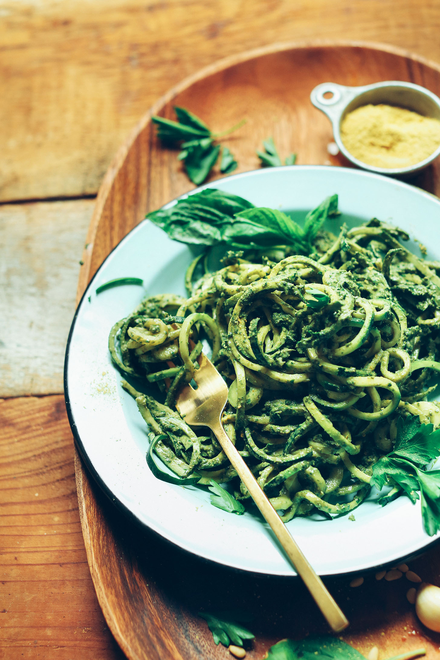 Bowl of spiralized zucchini noodles with Easy Vegan Pesto