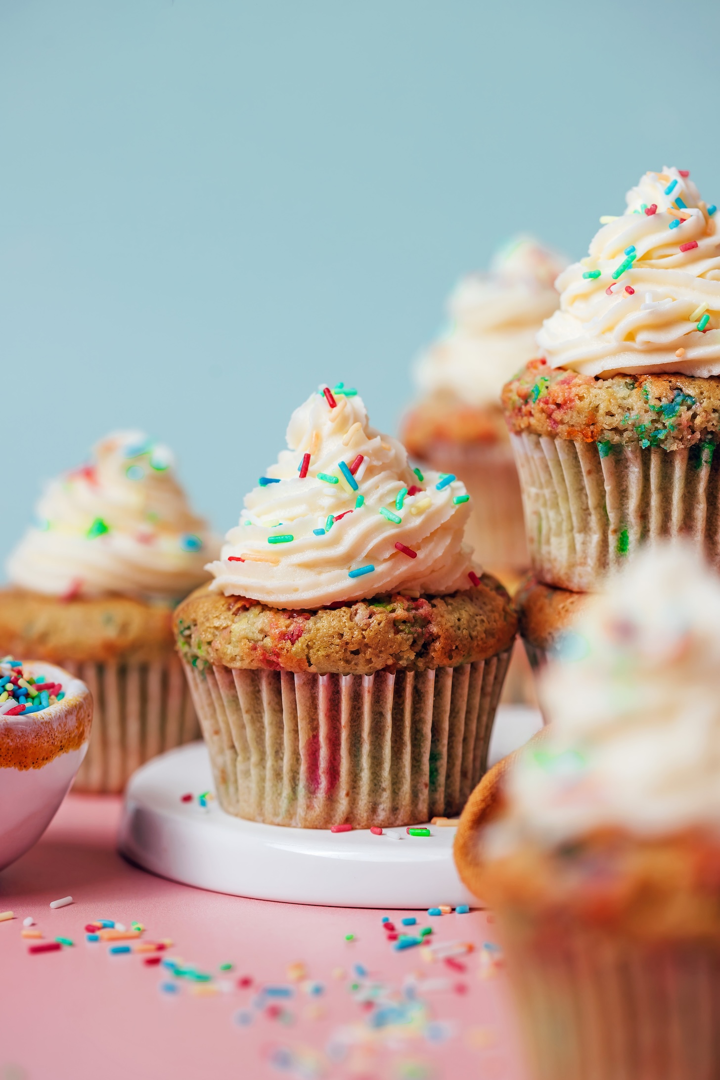 Gluten-free funfetti cupcakes decorated with vanilla buttercream and rainbow sprinkles