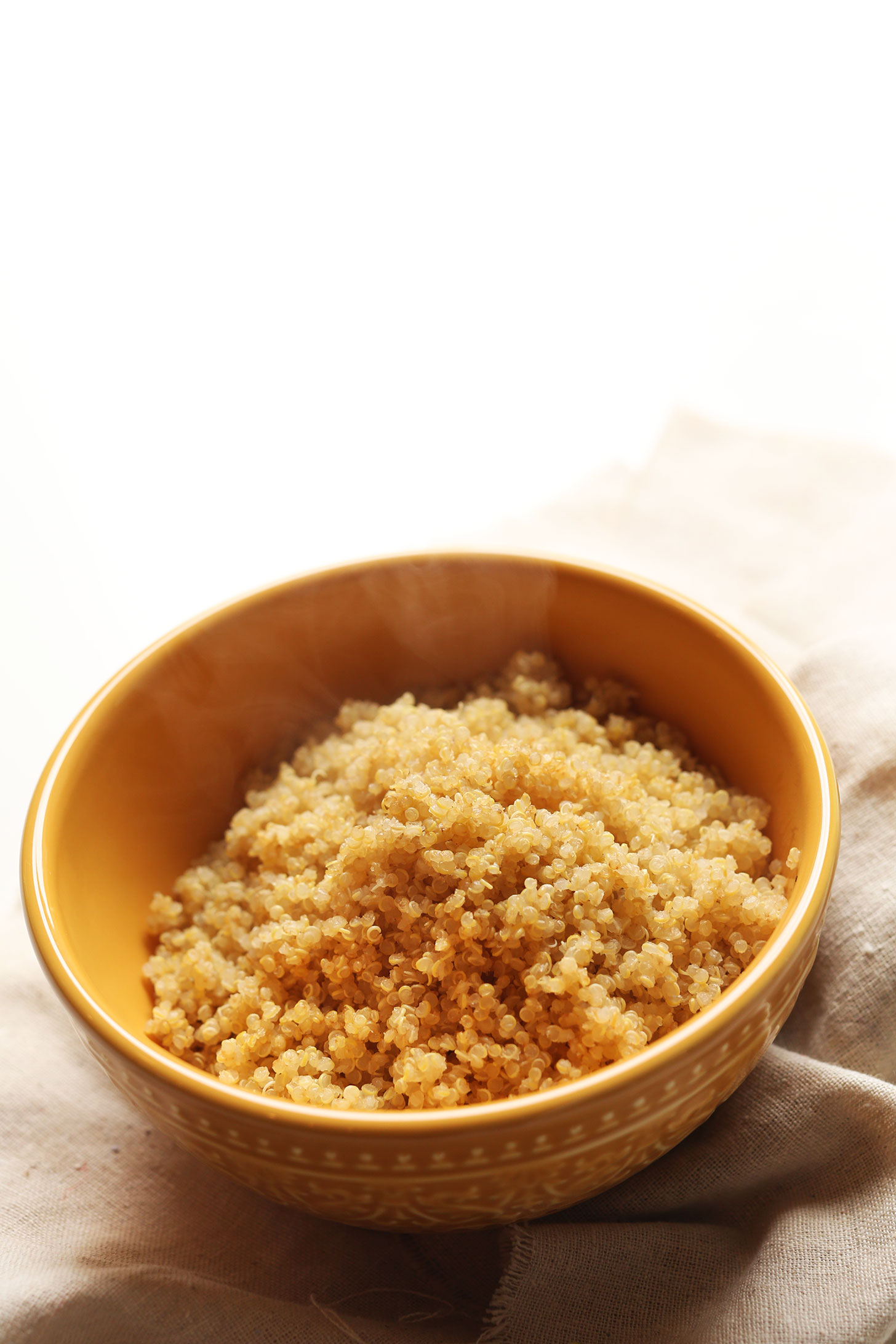 A bowl of quinoa for making a gluten-free vegan Asian-inspired quinoa salad