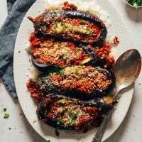 Platter of four Moroccan-Spiced Lentil Stuffed Eggplants
