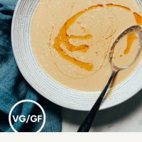 Toasted sesame oil drizzled on a bowl of Ginger Miso Tahini Dressing