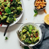 Bowls of Broccoli Pesto Pasta Salad made with gluten-free pasta