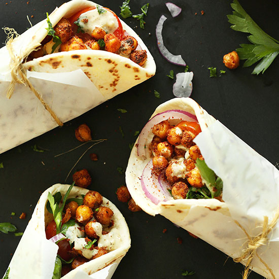 Three healthy Chickpea Shawarma Wraps on a baking sheet