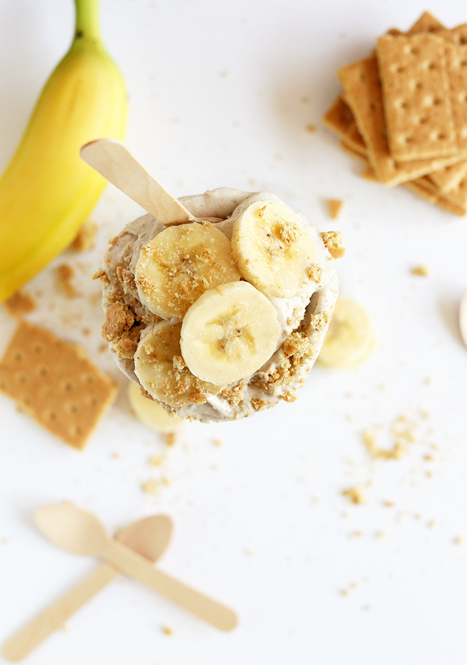 Top down shot of a vegan Banana Cream Pie topped with sliced banana and graham cracker crumble