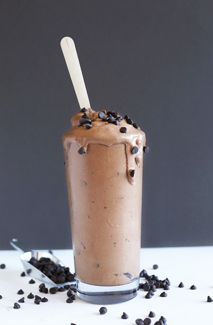 Tall glass filled with our super creamy vegan Chocolate Chocolate Chip Blizzard