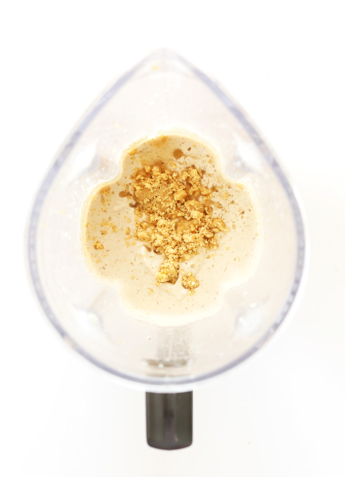 Blender filled with ingredients for Vegan Banana Cream Pie Blizzards